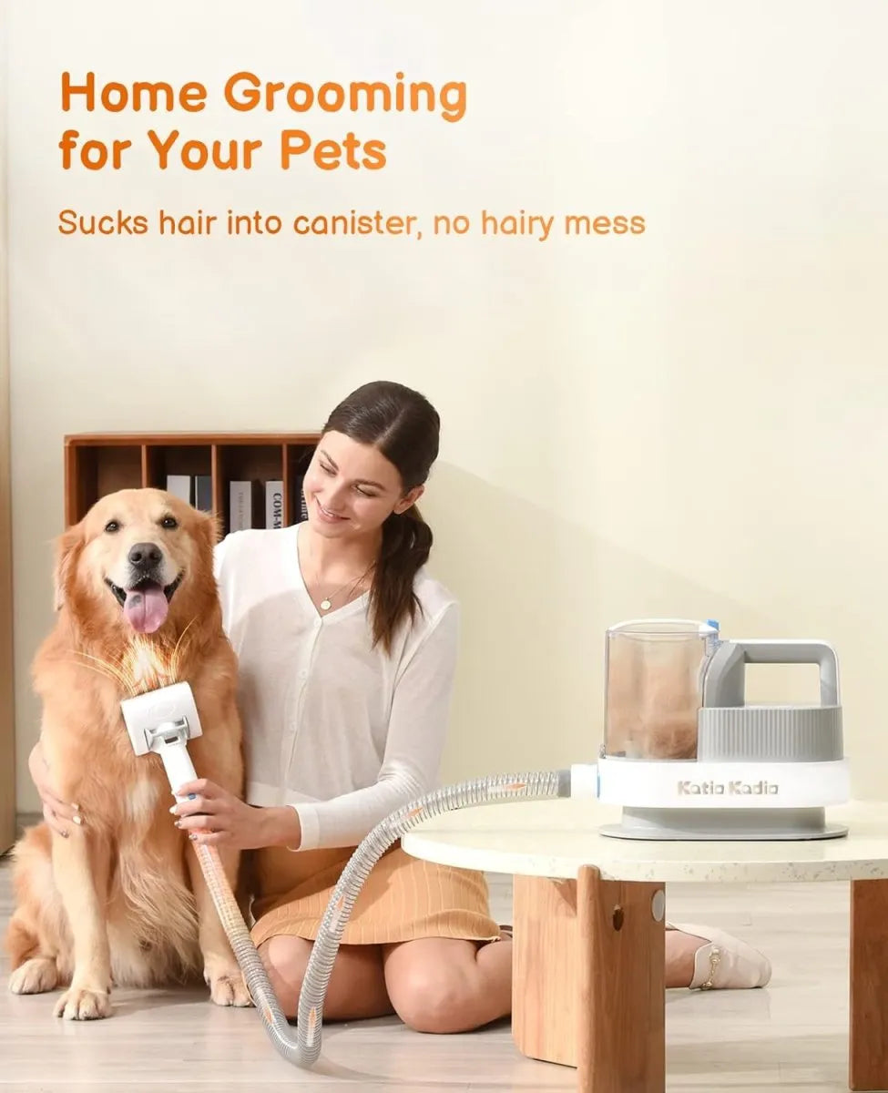Woman grooming a dog with a pet grooming tool on a light-colored floor.