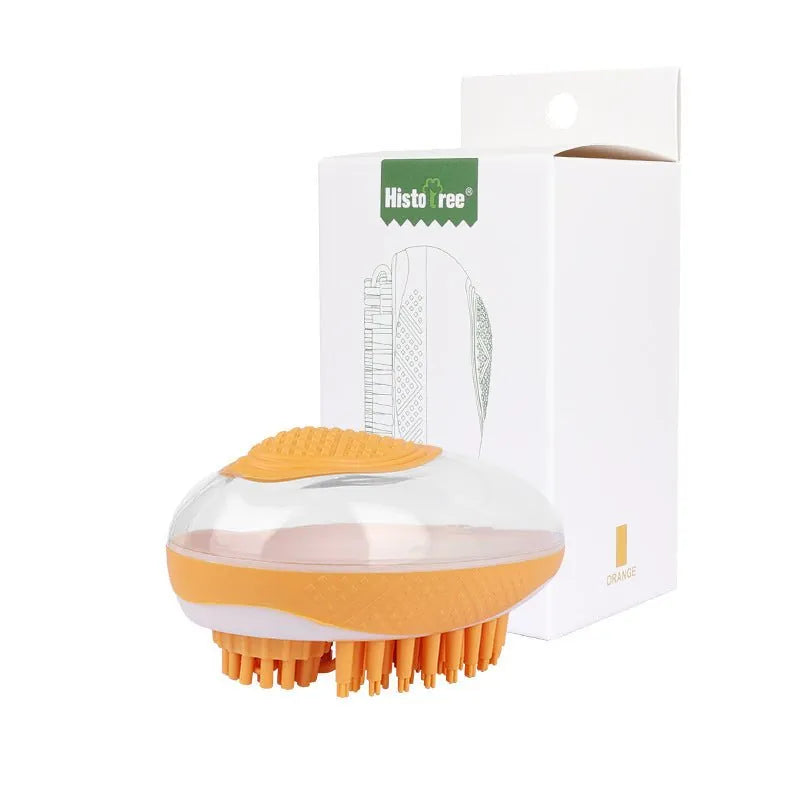 Orange and white grooming brush with Histo Tree packaging on a white background