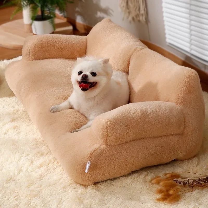 Dog lying on a beige pet bed in a cozy room with a plant and table.