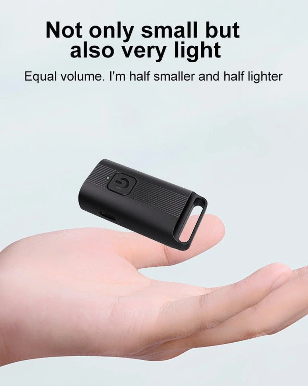 Small black device held in a hand with text highlighting its size and weight.